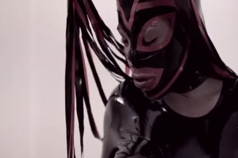 ladyboy In Latex Bodysuit