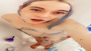 nice-looking gal in nature's garb Taking A Shower